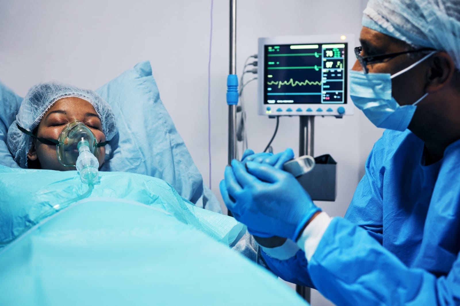 A patient receiving monitored interventional cardiac care