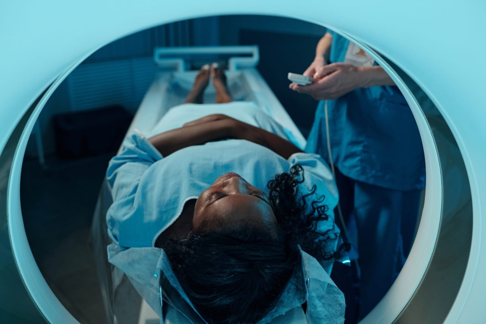 A patient undergoing a CT scan