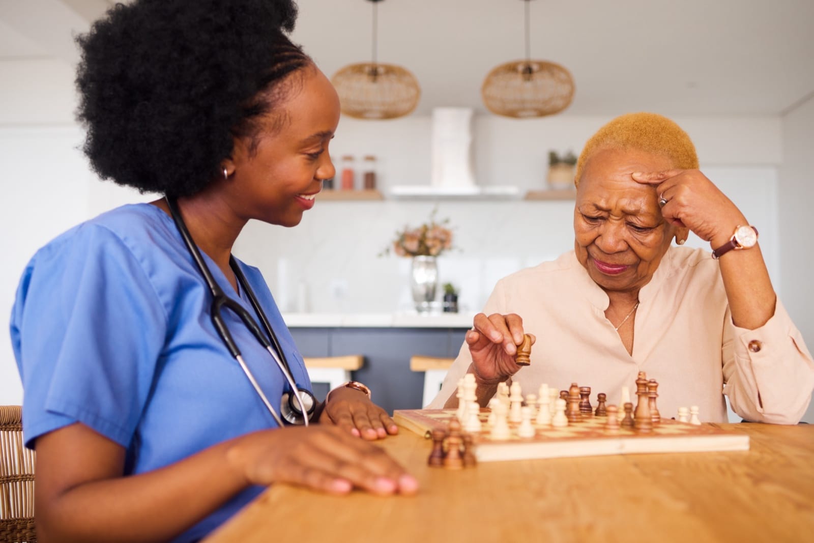 A clinician supporting an older patient during stroke recovery